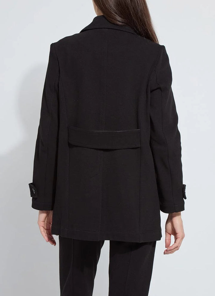Person wearing a black coat on a white background