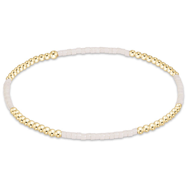 Enewton Hope Blissful Bracelet 26FW accessory featuring a delicate design in soft, neutral tones.