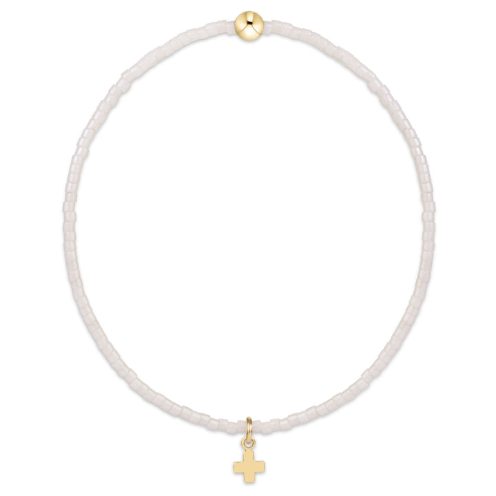 Enewton Hope Classic Signature Cross 26FW accessory in a milk finish, featuring a classic cross design