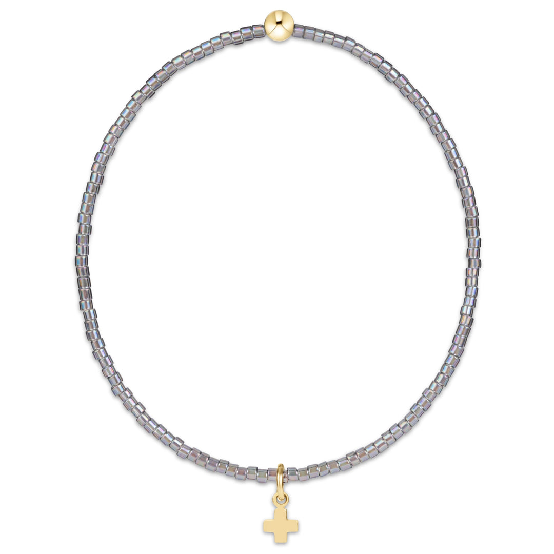 Enewton Hope Classic Signature Cross accessory in a 26FW design, shown in close-up with a polished metal finish