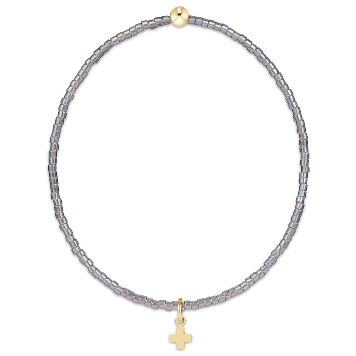 Enewton Hope Classic Signature Cross accessory in a 26FW design, shown in close-up with a polished metal finish