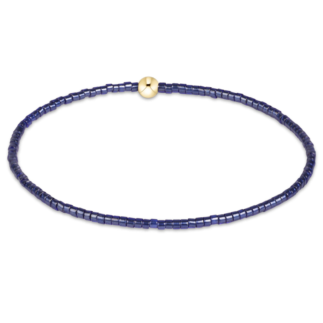 Enewton Hope Classic Bracelet 26FW accessory featuring a stylish design with delicate chain and emblem details.