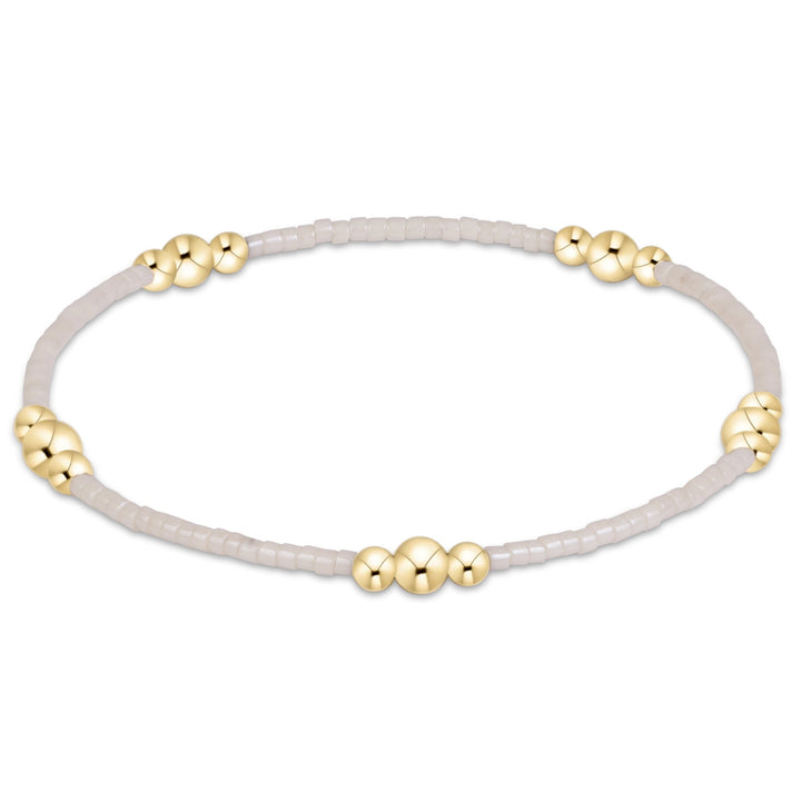 Enewton Hope Purpose Gold Bracelet 26FW, elegant jewelry accessory with a sleek gold finish, displayed on a neutral background.