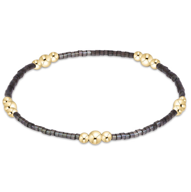 Enewton Hope Purpose Gold Bracelet 26FW, stylish accessories with a sleek gold design, elegantly displayed against a neutral background.