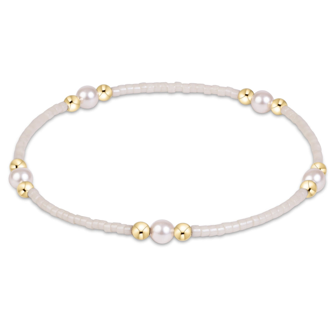 Enewton Hope Purpose Pearl Bracelet 26FW with white pearls and silver accents, stylish accessory for elegant outfits.