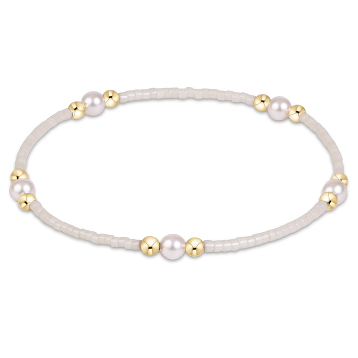 Enewton Hope Purpose Pearl Bracelet 26FW with white pearls and silver accents, stylish accessory for elegant outfits.
