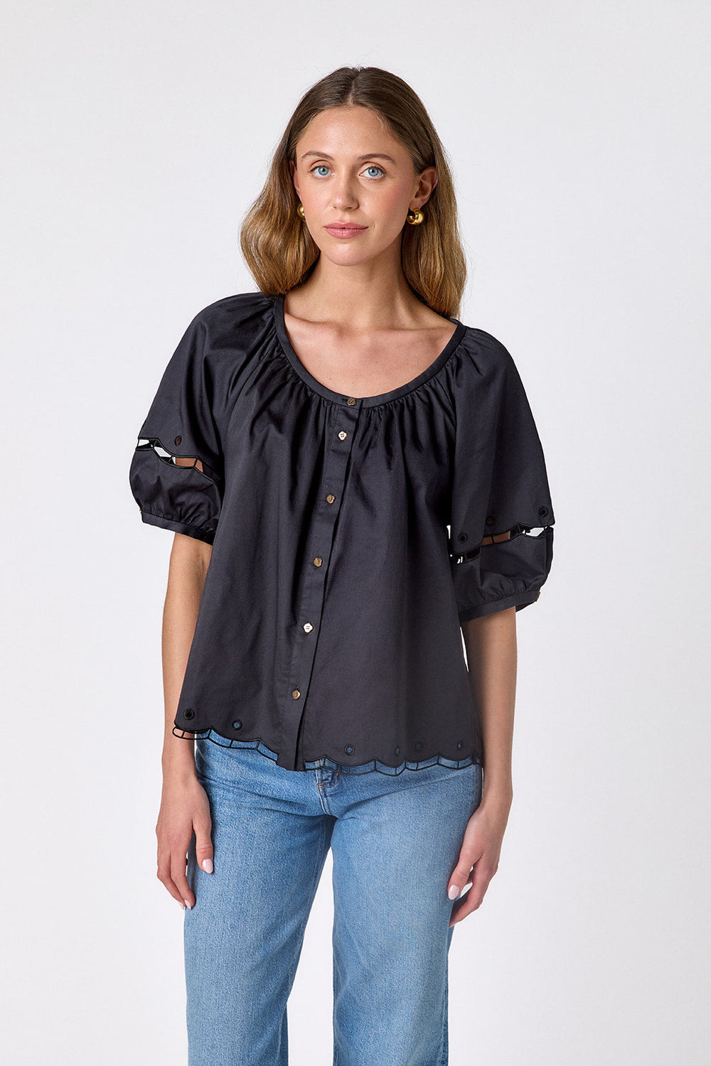 Black Crosby by Mollie Burch Perrie Top, stylish women's top with a sleek design, shown on a model.