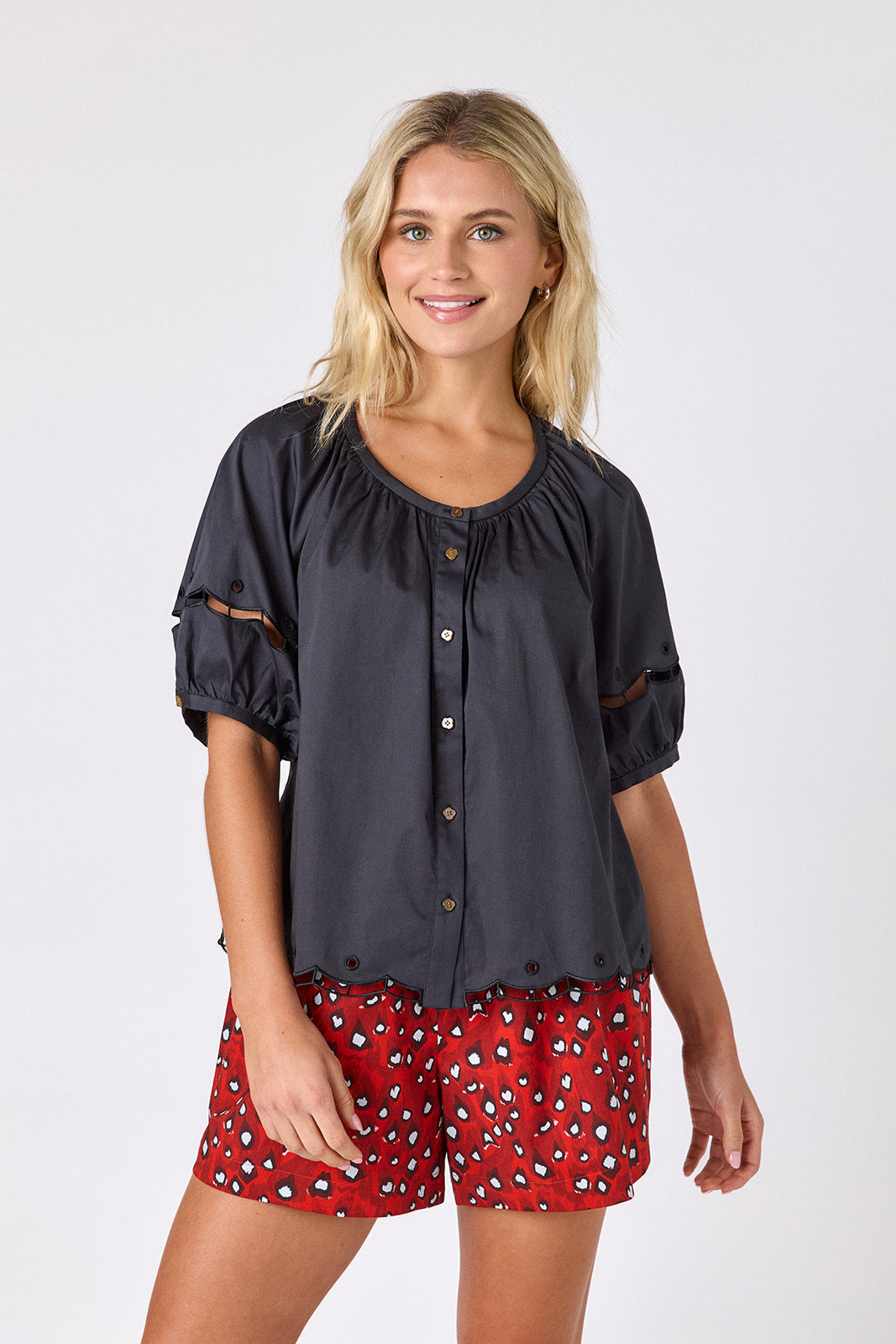 Black Crosby by Mollie Burch Perrie Top, a stylish women's sleeveless blouse with a flowy fit and V-neck design.
