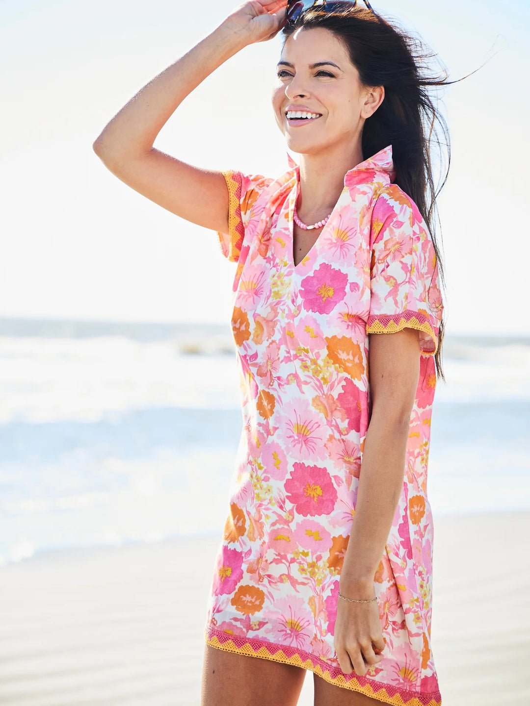 Pink watercolor beach tunic dress by Beau & Ro, flowing lightweight fabric perfect for summer seaside wear.