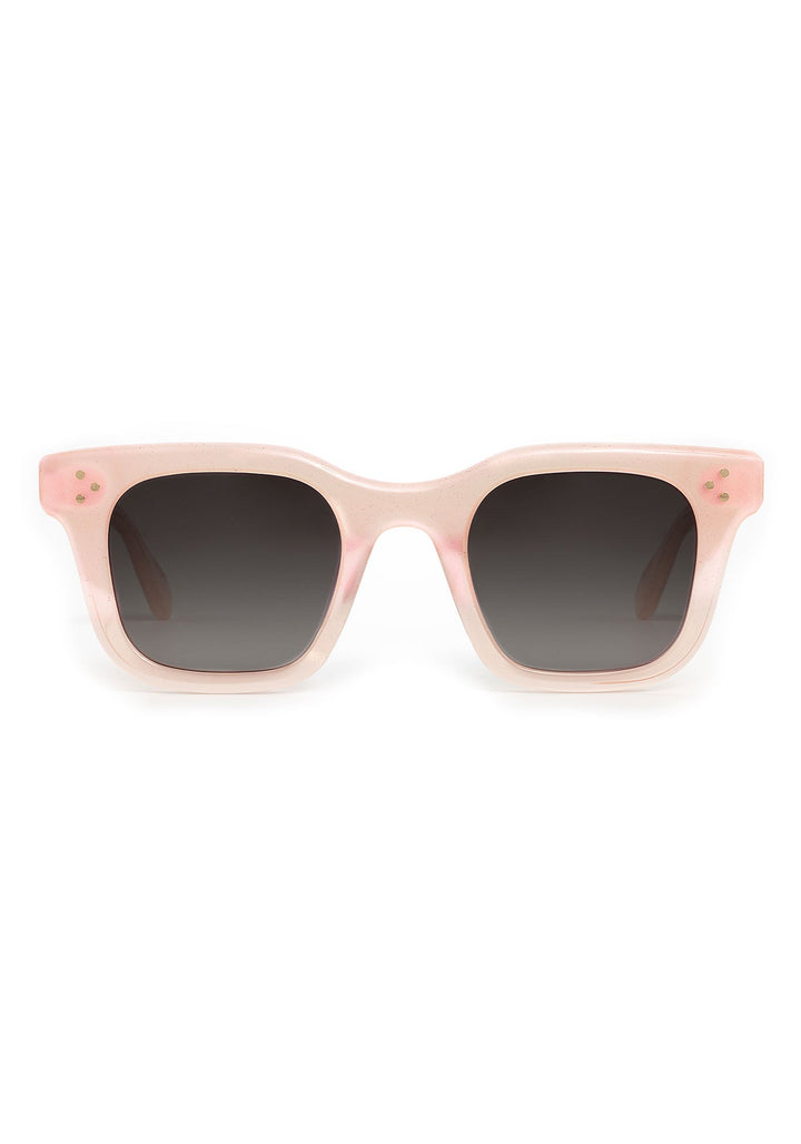 KREWE Celeste Sparkling Rose sunglasses with pink tinted lenses and decorative sparkling accents, stylish accessories for sunny days.