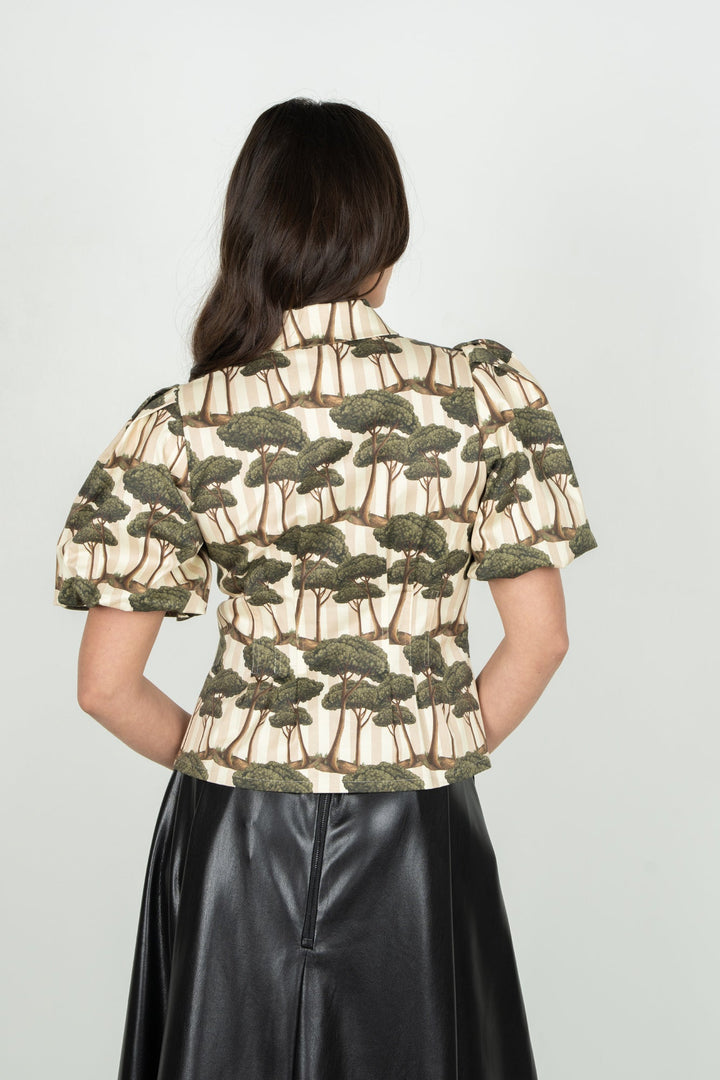 Back view of Emily McCarthy Britt Top featuring umbrella pine pattern on soft fabric, stylish women’s top with a relaxed fit.