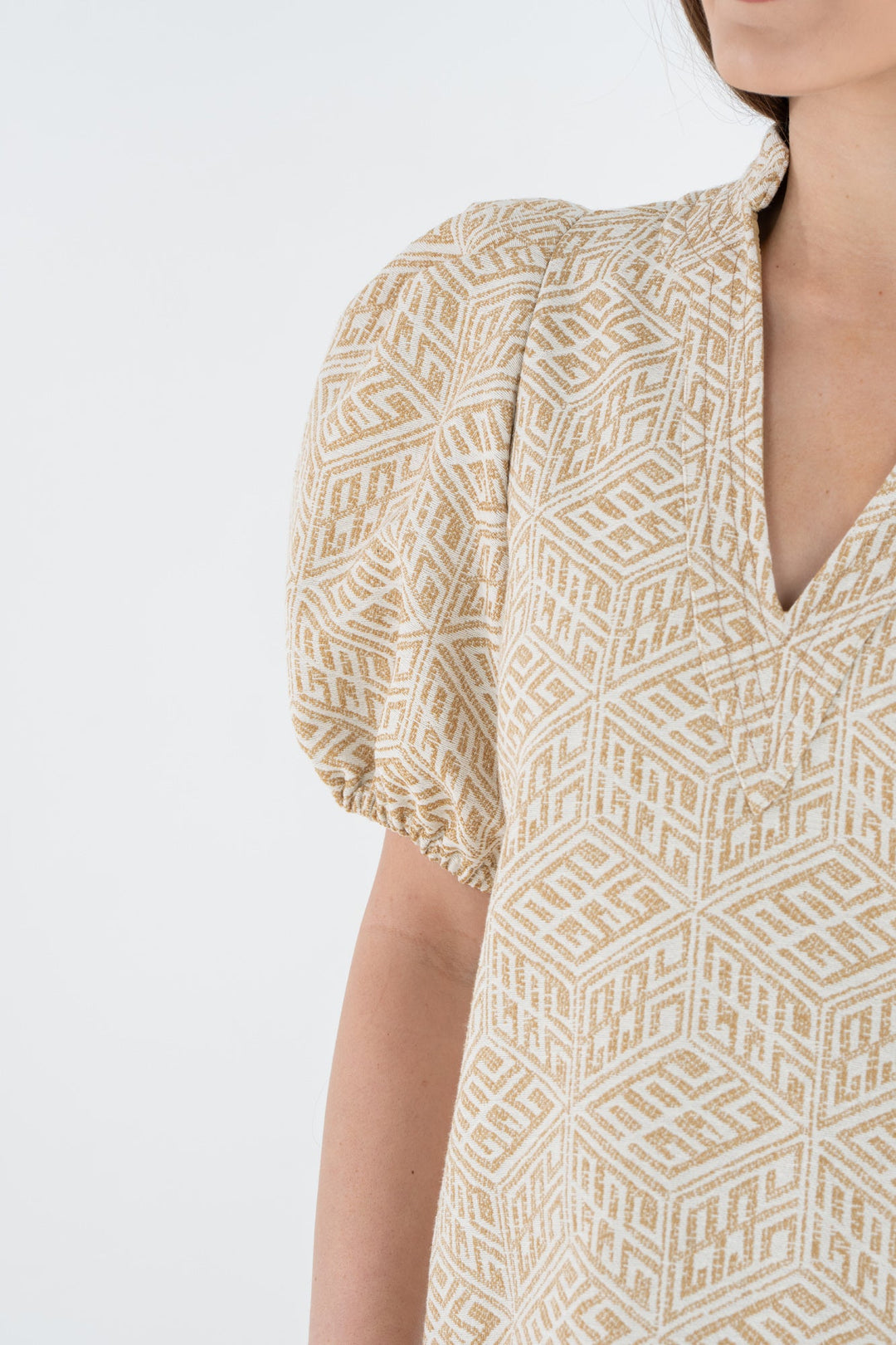 Emily McCarthy Hampton Mini Dress with mosaic monogram detail, stylish sleeveless dress for warm-weather occasions.