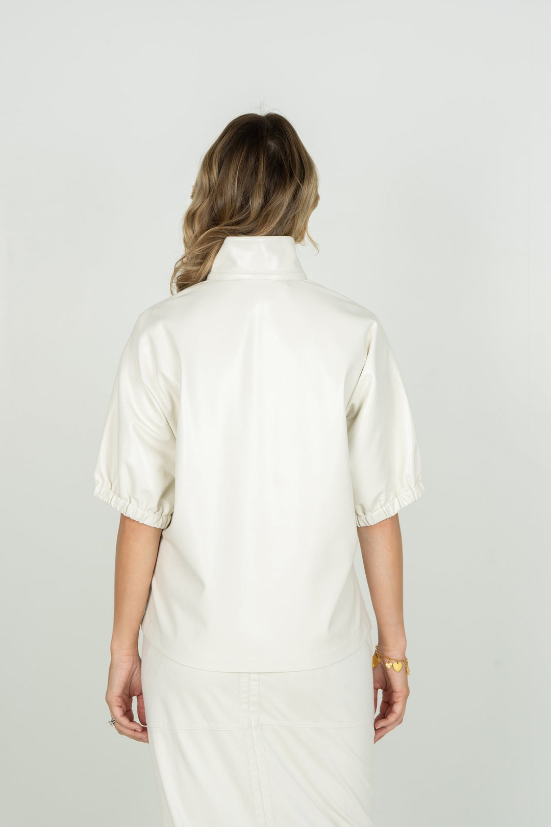 Emily McCarthy Poppy Top in Carrara, back view, showcasing stylish design and fabric details of this trendy tops piece.