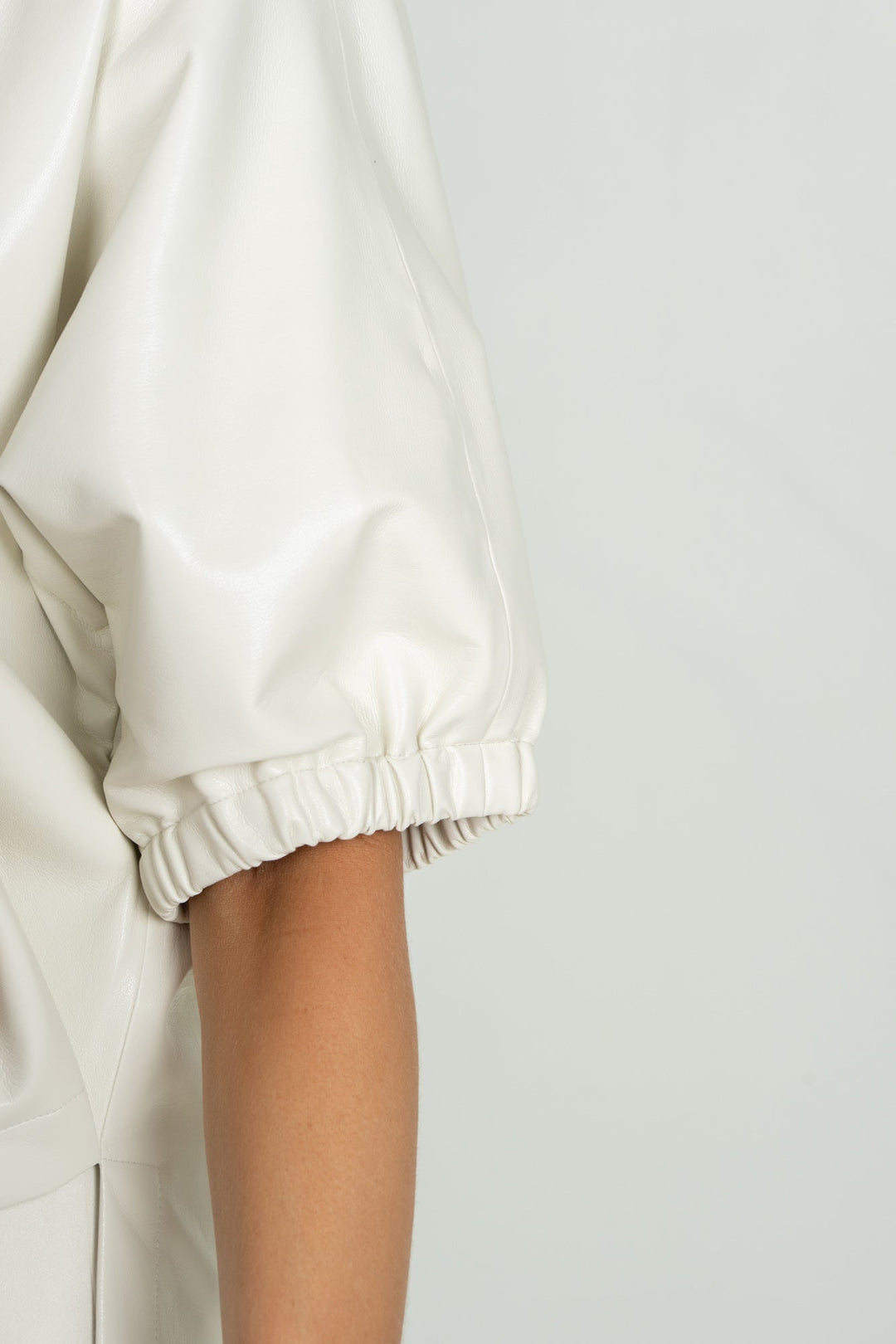Close-up of Emily McCarthy Poppy Top in Carrara fabric, showcasing the detailed design and fabric texture.