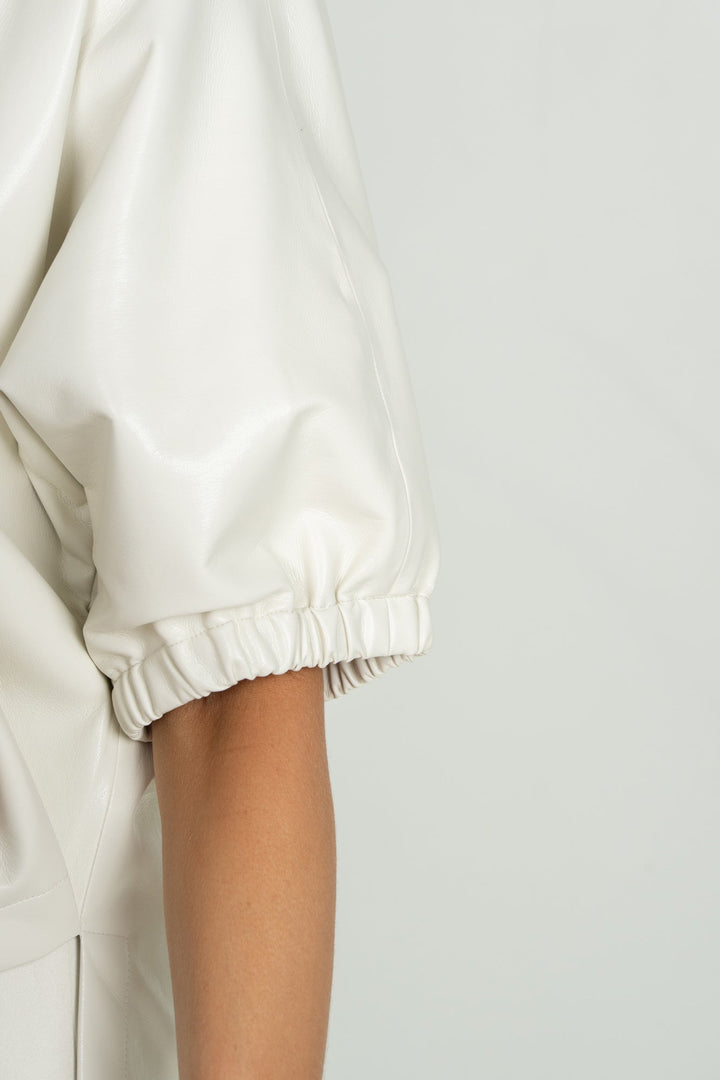 Close-up of Emily McCarthy Poppy Top in Carrara fabric, showcasing the detailed design and fabric texture.