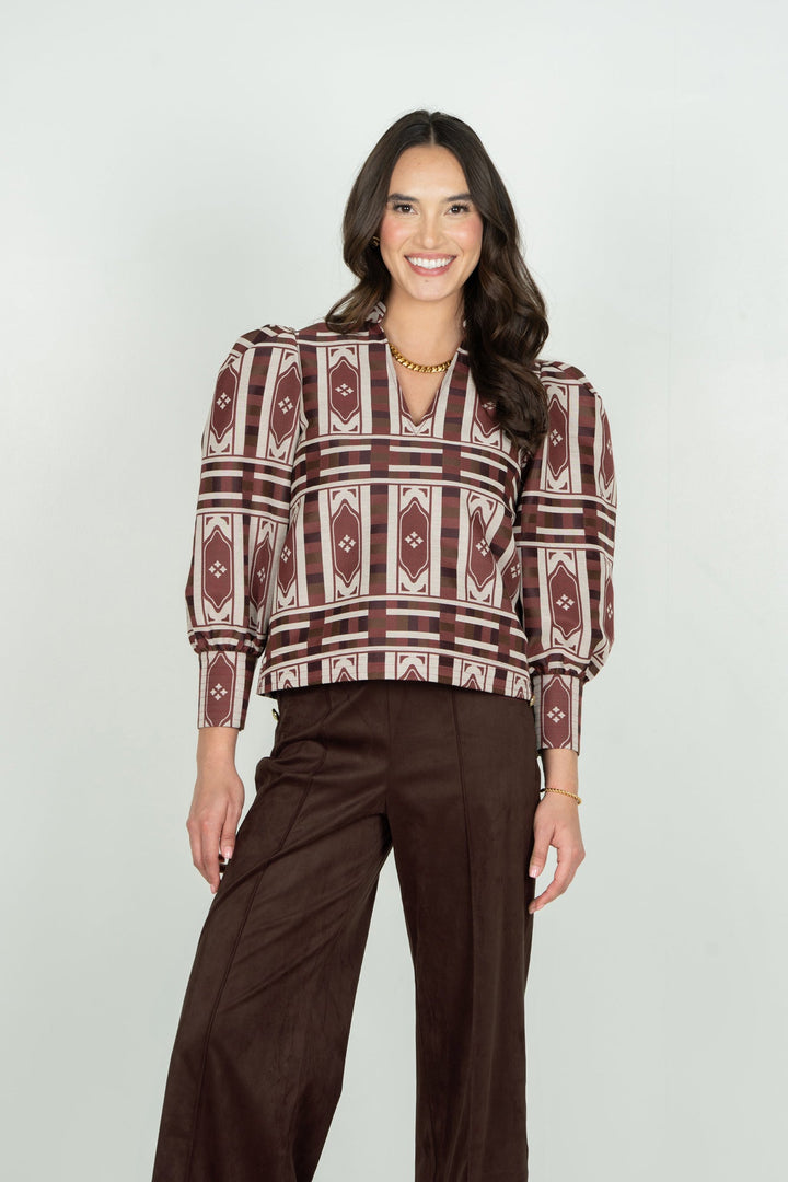 Front view of Emily McCarthy Hampton Duomo Jacquard Top, featuring intricate woven patterns and a stylish neckline.
