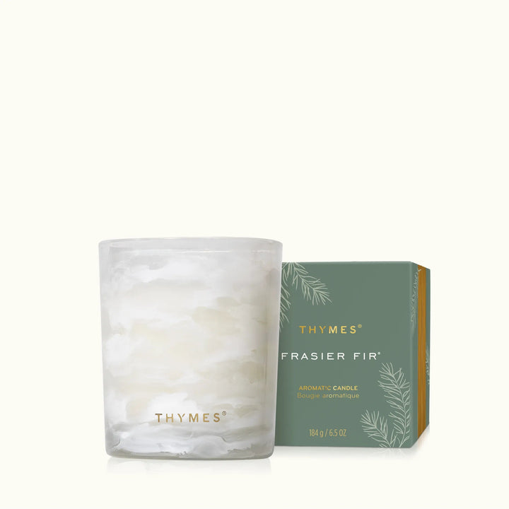 Thymes Tidings boxed candle with festive design, home decor candle in a decorative box for holiday ambiance.