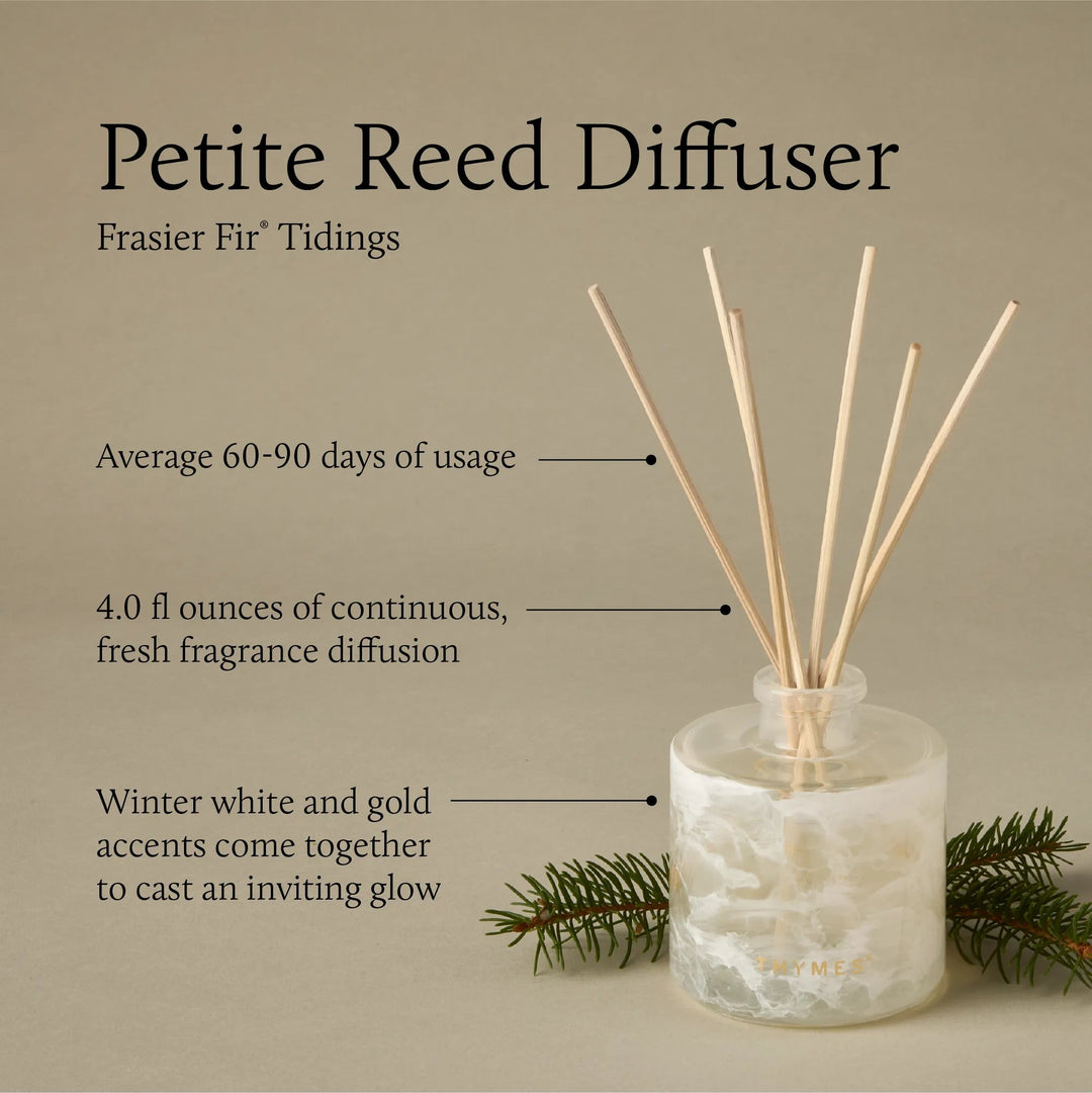 Thymes Tidings Petite Diffuser for home use, featuring a sleek design and natural reed sticks for fragrance diffusion.