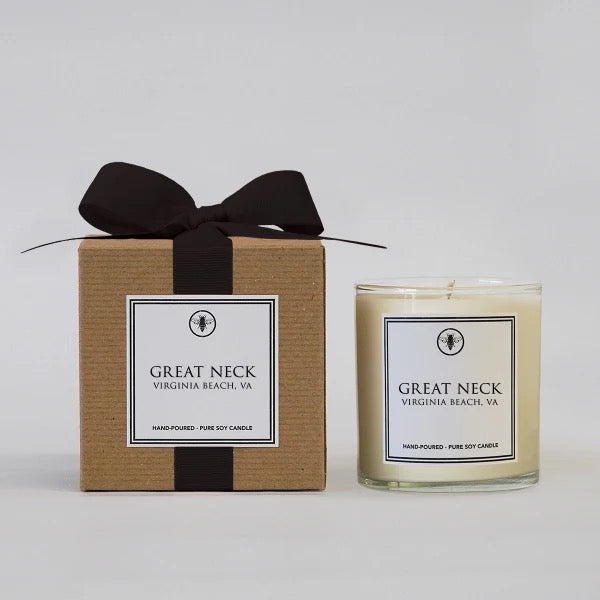Ella B. Candles Neighborhood Candles in Virginia Lemon Cabana scent, featuring a tall glass candle with a bright yellow lemon design.