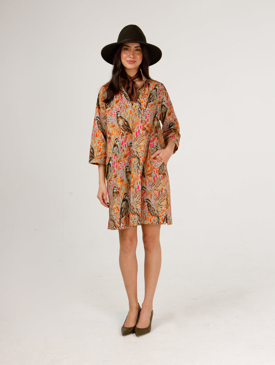 Holly Shae Wildwood Wing Madi Dress in flowing fabric with floral pattern, sleeveless design, and V-neck neckline.
