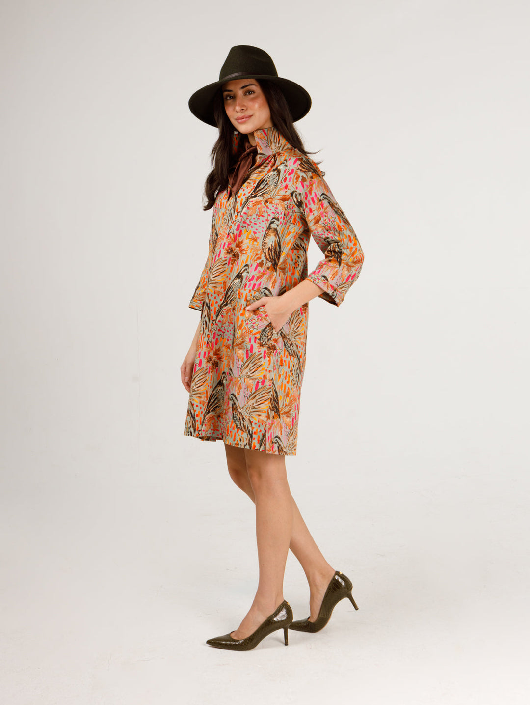 Holly Shae Wildwood Wing Madi Dress displayed on a mannequin, featuring flowy fabric and intricate floral patterns.