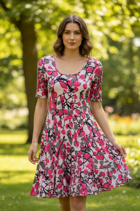 Cherry Blossom midi dress by Dress Addict, showcasing a floral pattern, flowing fabric, and elegant design on a model.