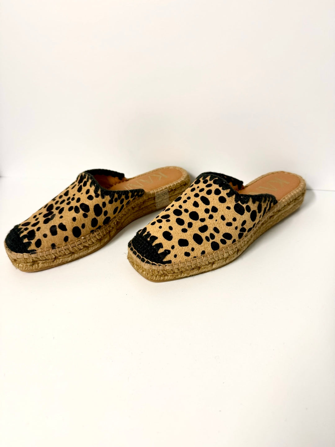 Kanna Shoes Lena Pony Slide accessories featuring a soft pink strap and decorative pony embellishment, perfect for casual wear.