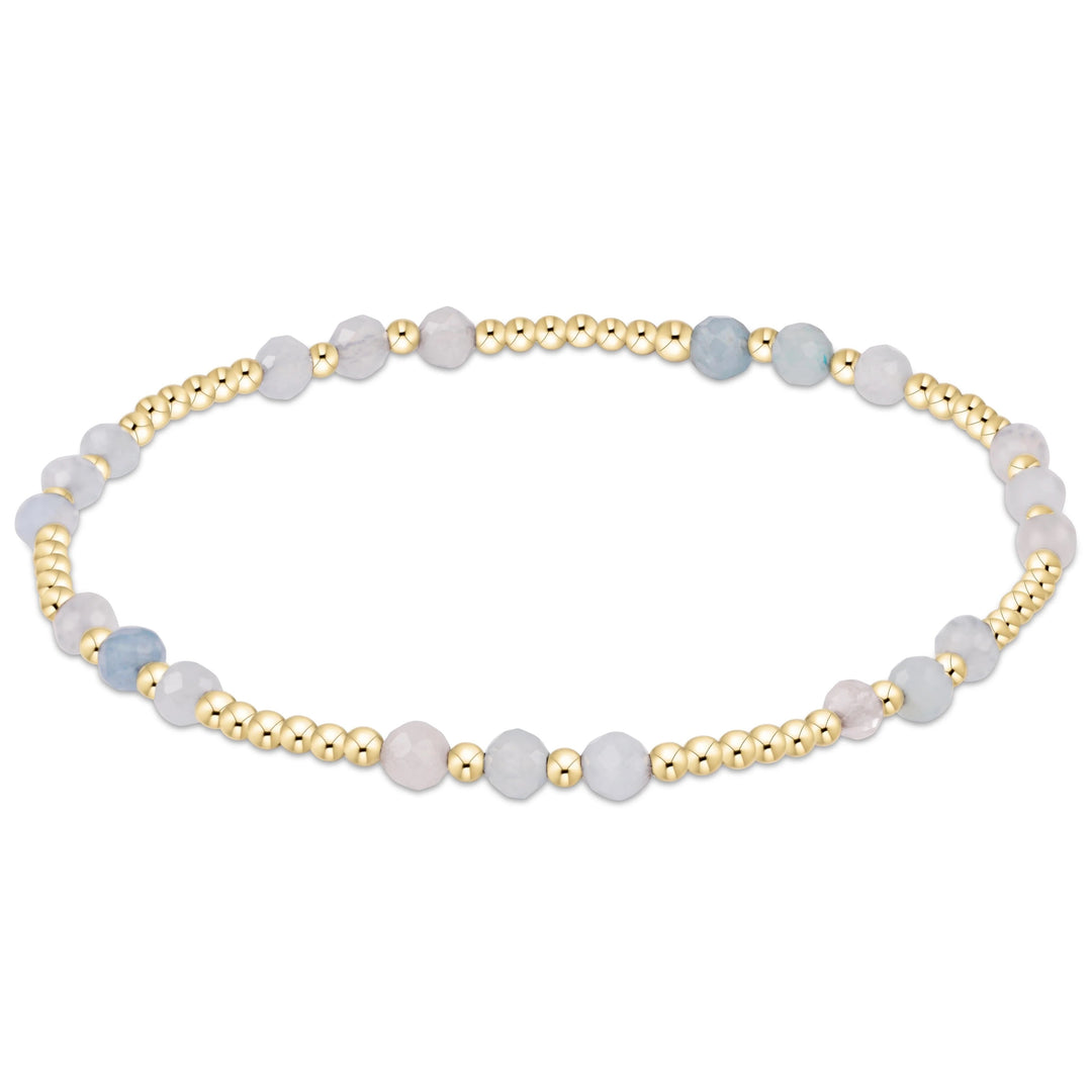 Joy Gem 3mm bracelet by Lemon Cabana featuring colorful gemstone beads on a stretch cord.