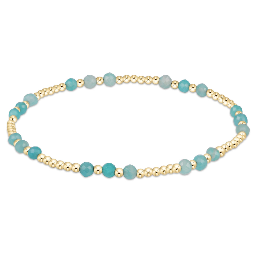 Joy Gem 3mm bracelet by Lemon Cabana featuring colorful gemstone beads on an elastic cord.