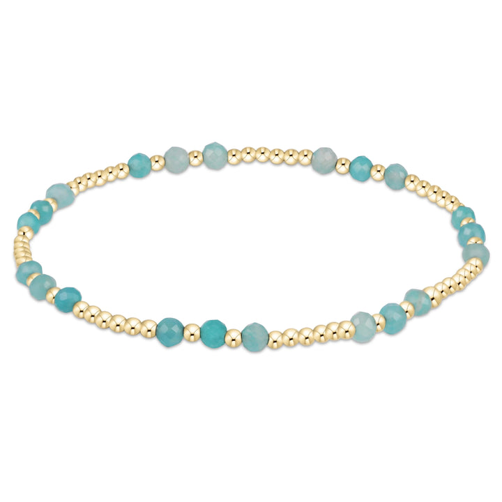 Joy Gem 3mm bracelet by Lemon Cabana featuring colorful gemstone beads on an elastic cord.