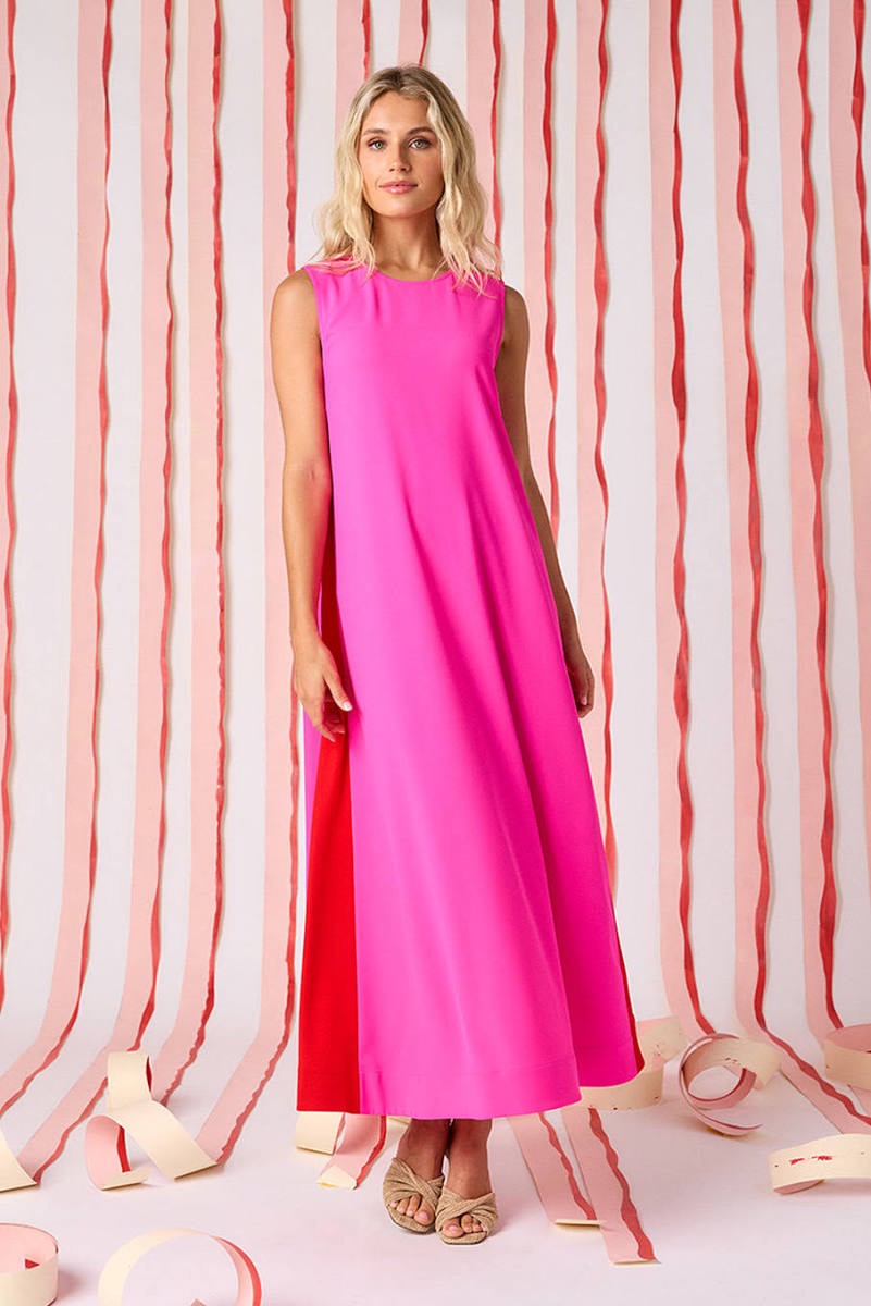 Crosby by Mollie Burch Owens dress displayed on a hanger, featuring a stylish, elegant design with intricate details.