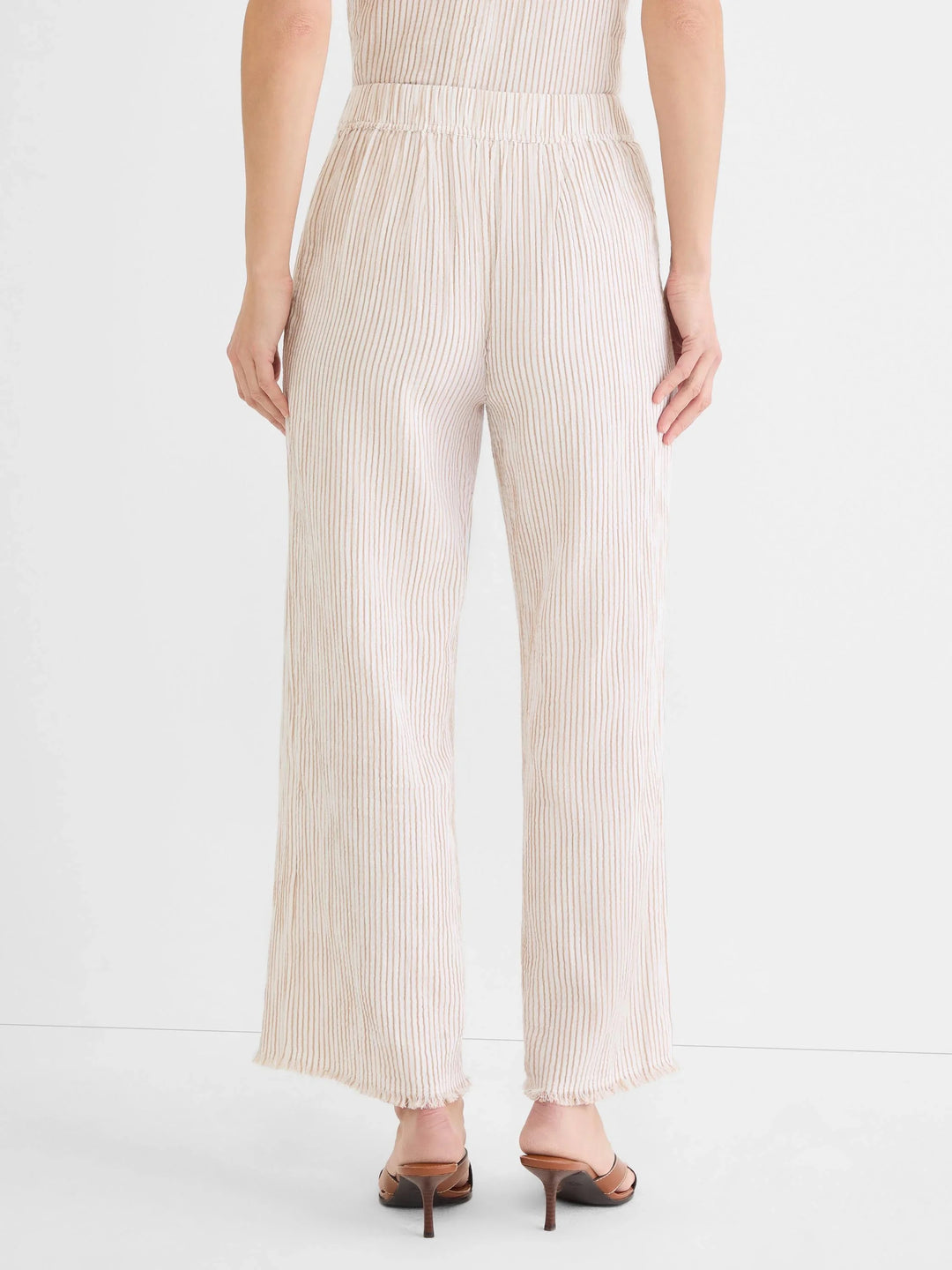 Nic & Zoe pinstripe gauze pant, lightweight bottoms with a relaxed fit and comfortable waistband, featuring subtle pinstripe pattern.