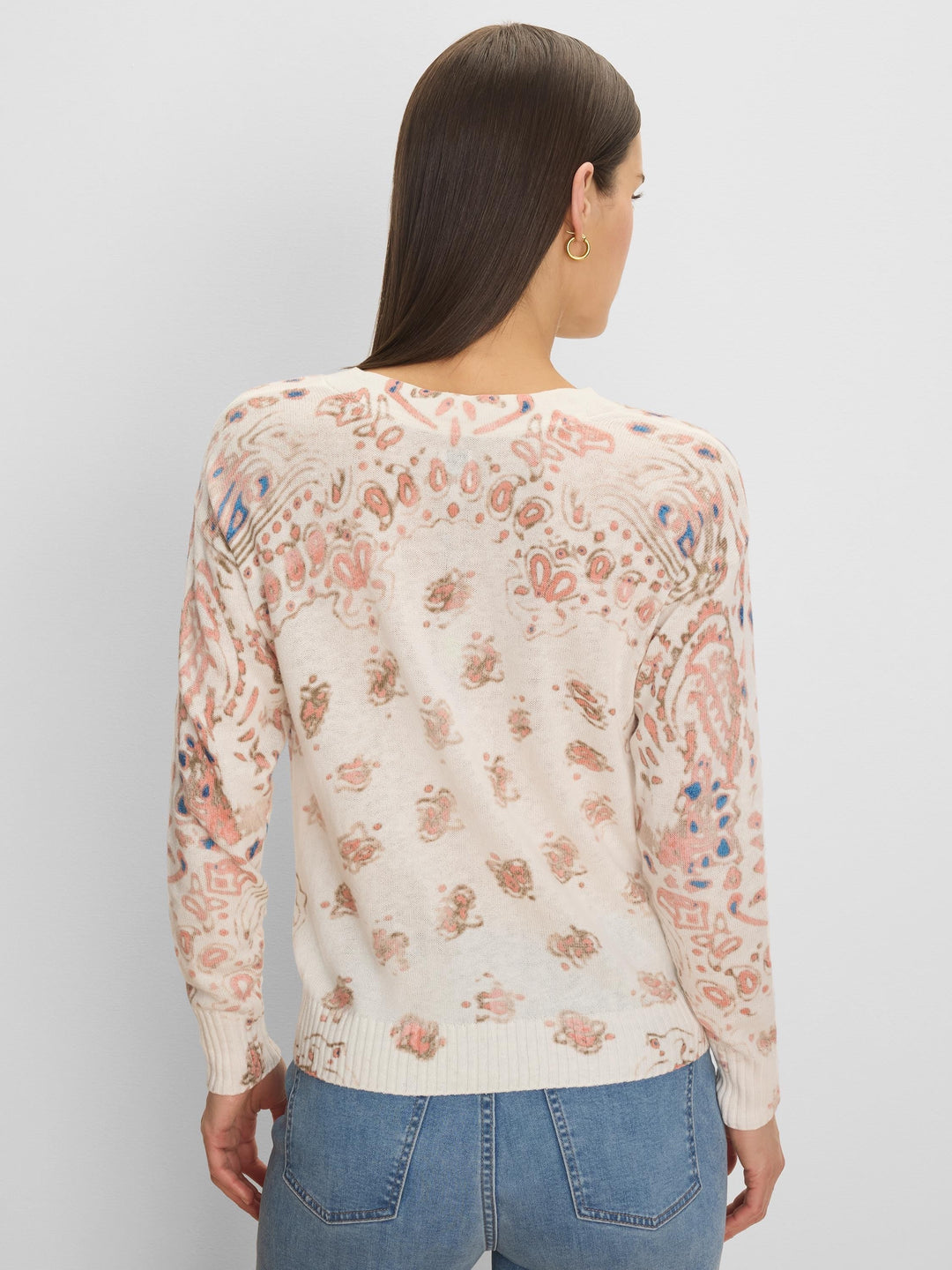 Pink paisley patterned sweater by Nic & Zoe, featuring a cozy knitted design and long sleeves.