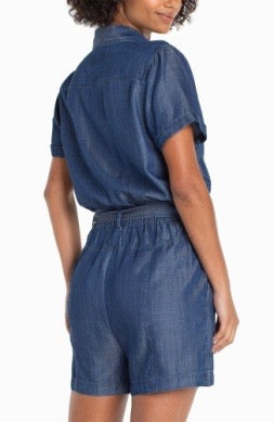 Liverpool Jeans denim short sleeve romper, casual bottoms with a relaxed fit and button-front design, displayed on a hanger.