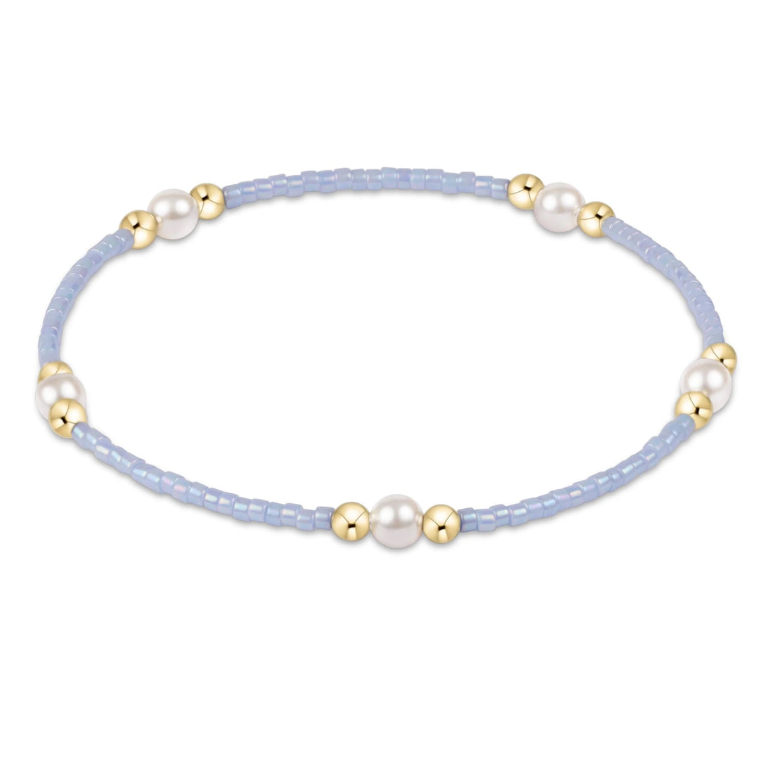 Enewton Hope Purpose Pearl Bracelet featuring elegant white pearls on a delicate adjustable string for stylish accessories.