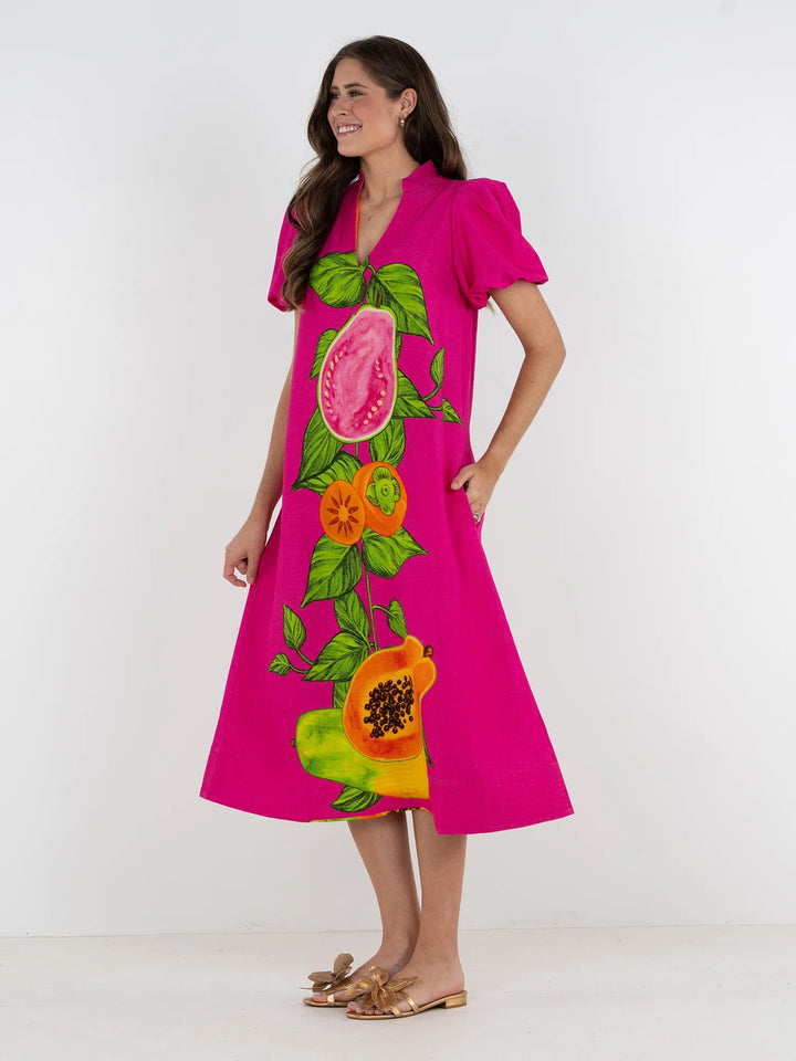 Emily McCarthy Hampton Papaya Vine Dress made of lightweight fabric with a floral vine pattern and a flattering fit.