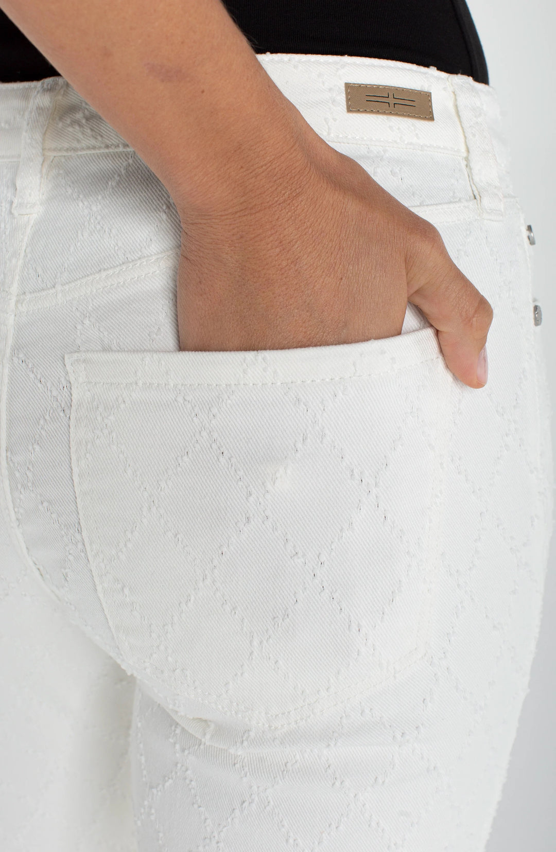 Liverpool Hannah crop flare bottoms with wide fray hem and side slit in white diamond fabric, showcasing a trendy, casual style.