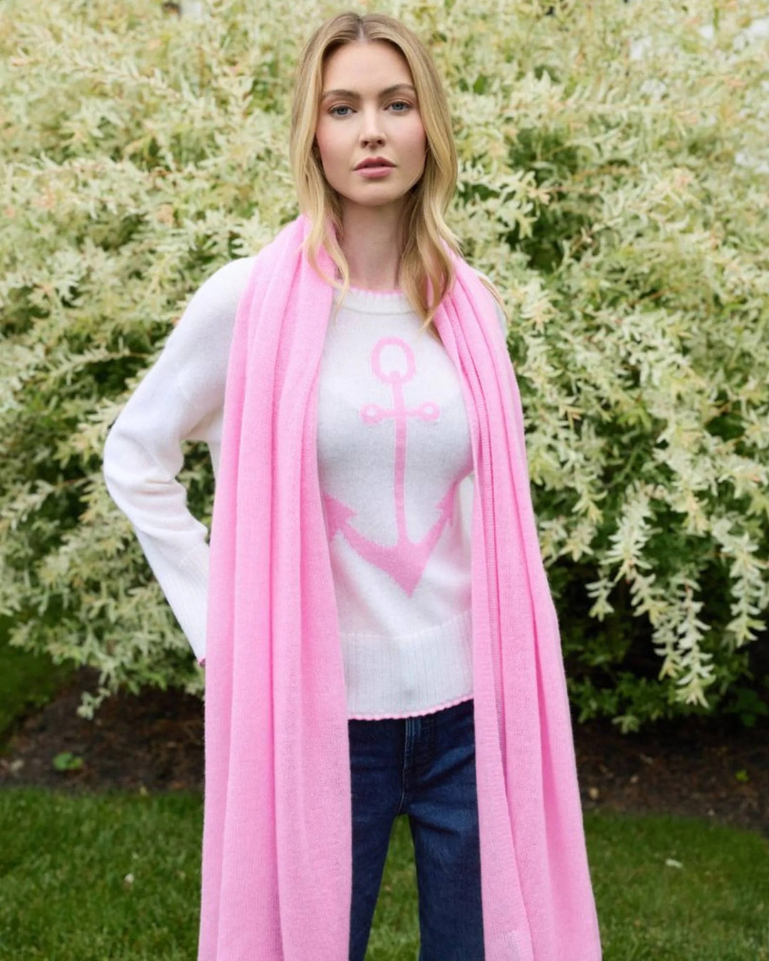 Alashan Cashmere 100% cashmere travel wrap draped over a chair, showcasing soft, luxurious fabric perfect for travel comfort.