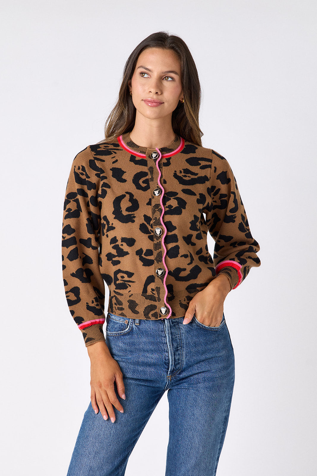 Crosby by Mollie Burch leopard cardigan, stylish long-sleeve tops with leopard print fabric displayed on a hanger.