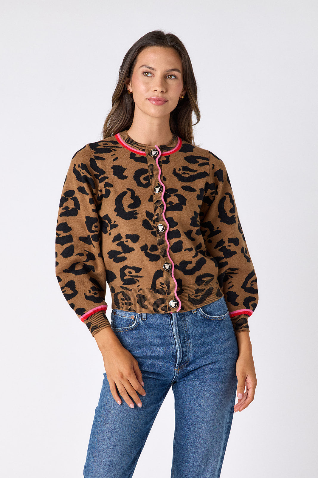 Crosby by Mollie Burch leopard print cardigan, cozy tops with a stylish leopard pattern, displayed on a hanger.