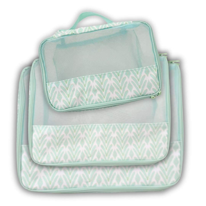 Laura Park Designs packing cubes with petite frond blue pattern, ideal for organized travel and gift-giving.