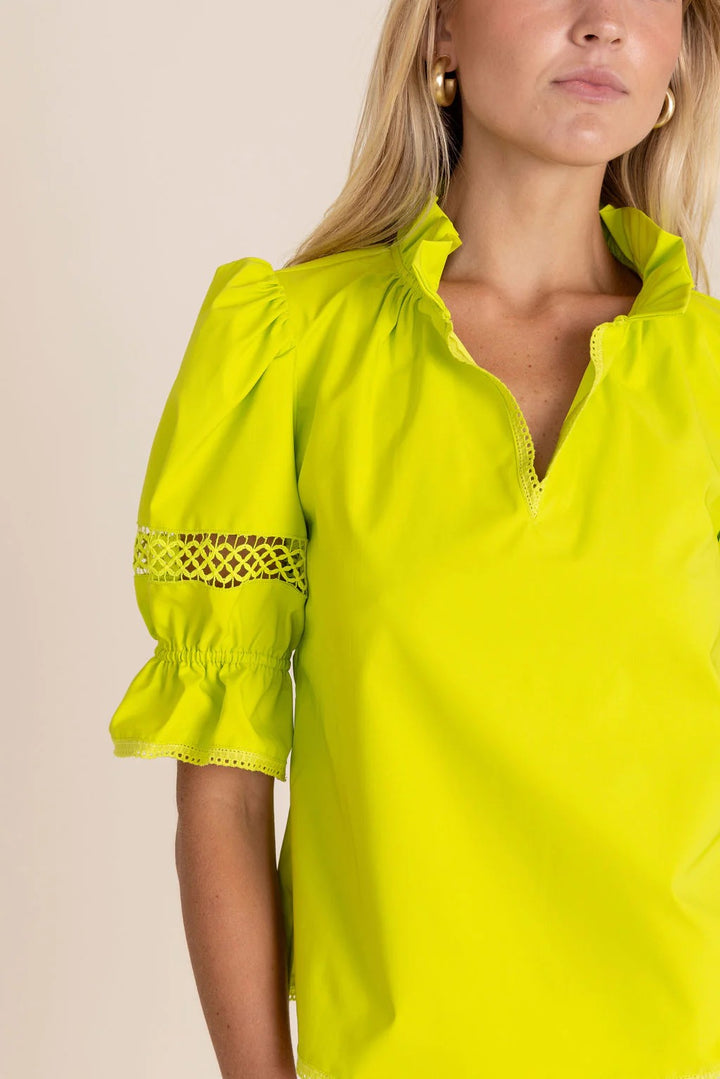 woman in bright yellow lottie top