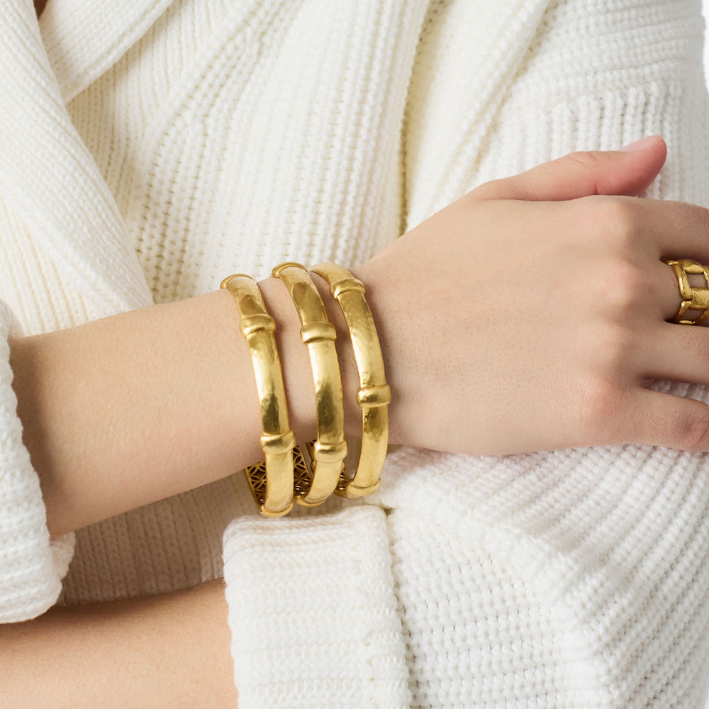 Gold Sahara Bangle by Julie Vos, elegant jewelry accessory featuring a sleek, polished gold design with intricate detailing.