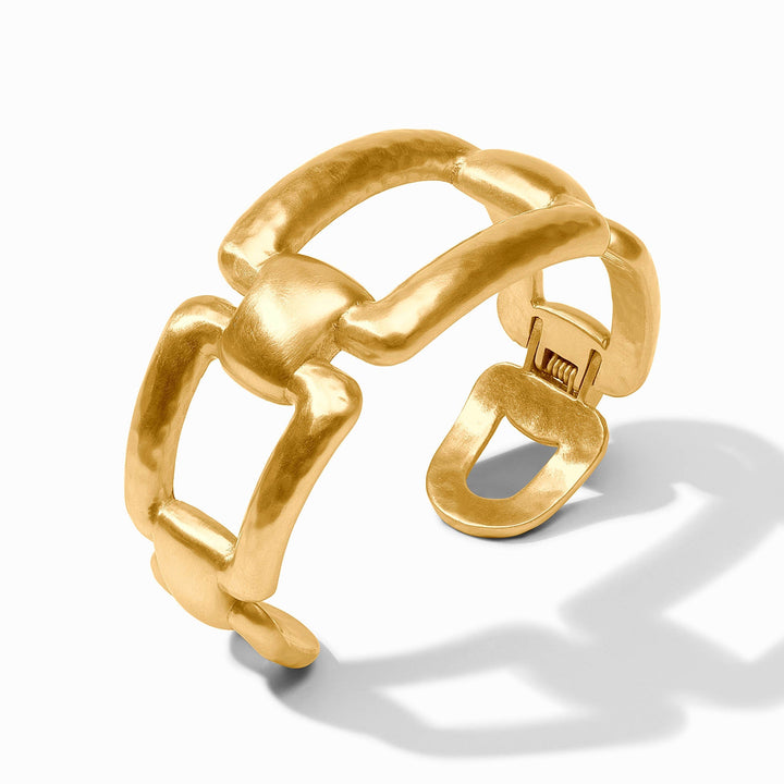 Gold Sahara cuff bracelet by Julie Vos, featuring a textured design and open cuff style, displayed standing.
