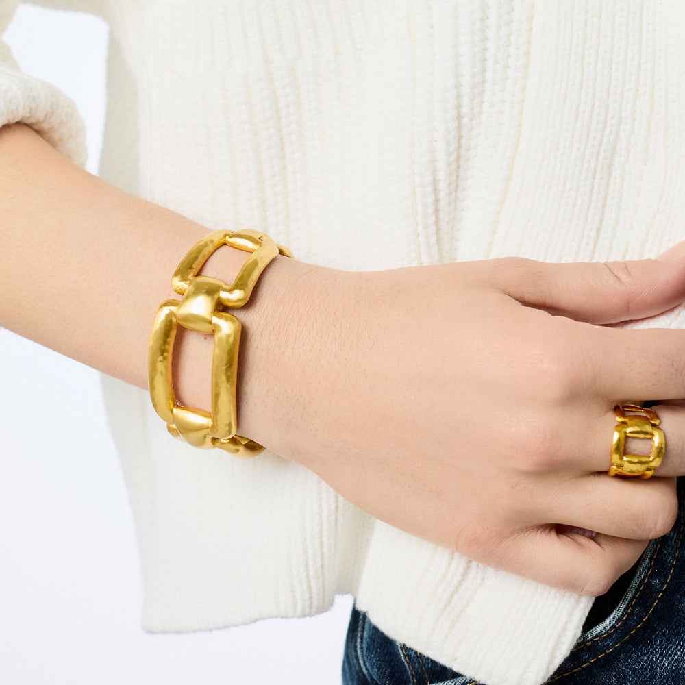 Gold Sahara cuff bracelet by Julie Vos, featuring a textured design and elegant accessory style, shown on a neutral background.