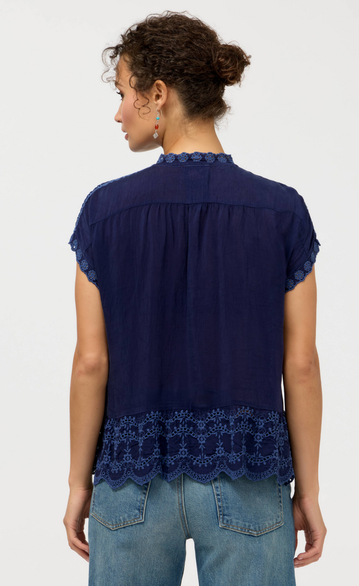 Johnny Was Astrud Romana blouse featuring flowy fabric and intricate patterns, styled as a stylish women's top.