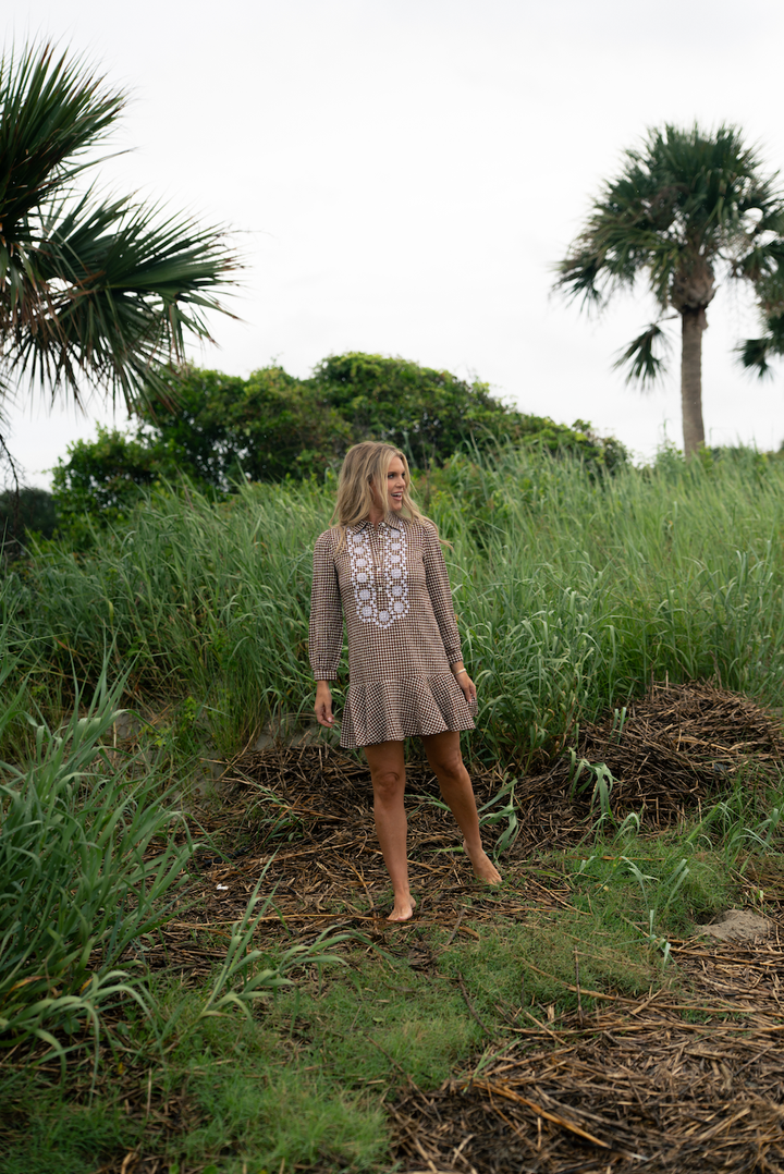 Sail to Sable gingham ruffle shirt dress featuring a button-up front, short sleeves, and a flattering waist tie.
