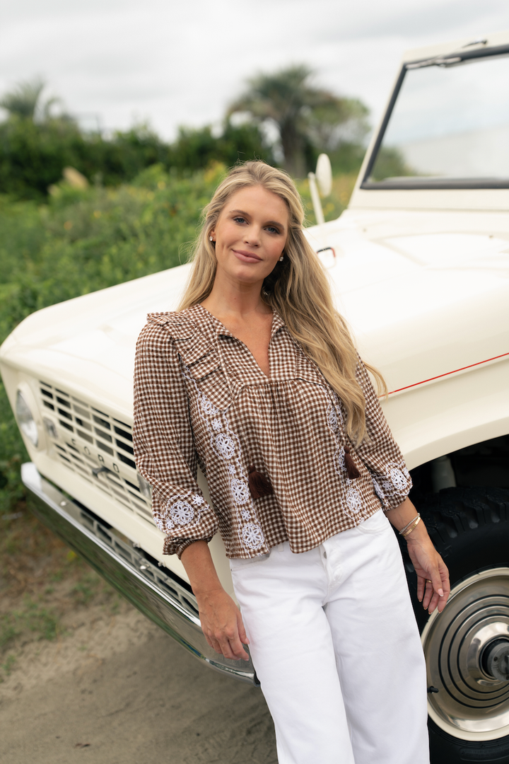 Sail to Sable gingham ruffle front top with short sleeves and button detail, stylish and lightweight for casual wear.