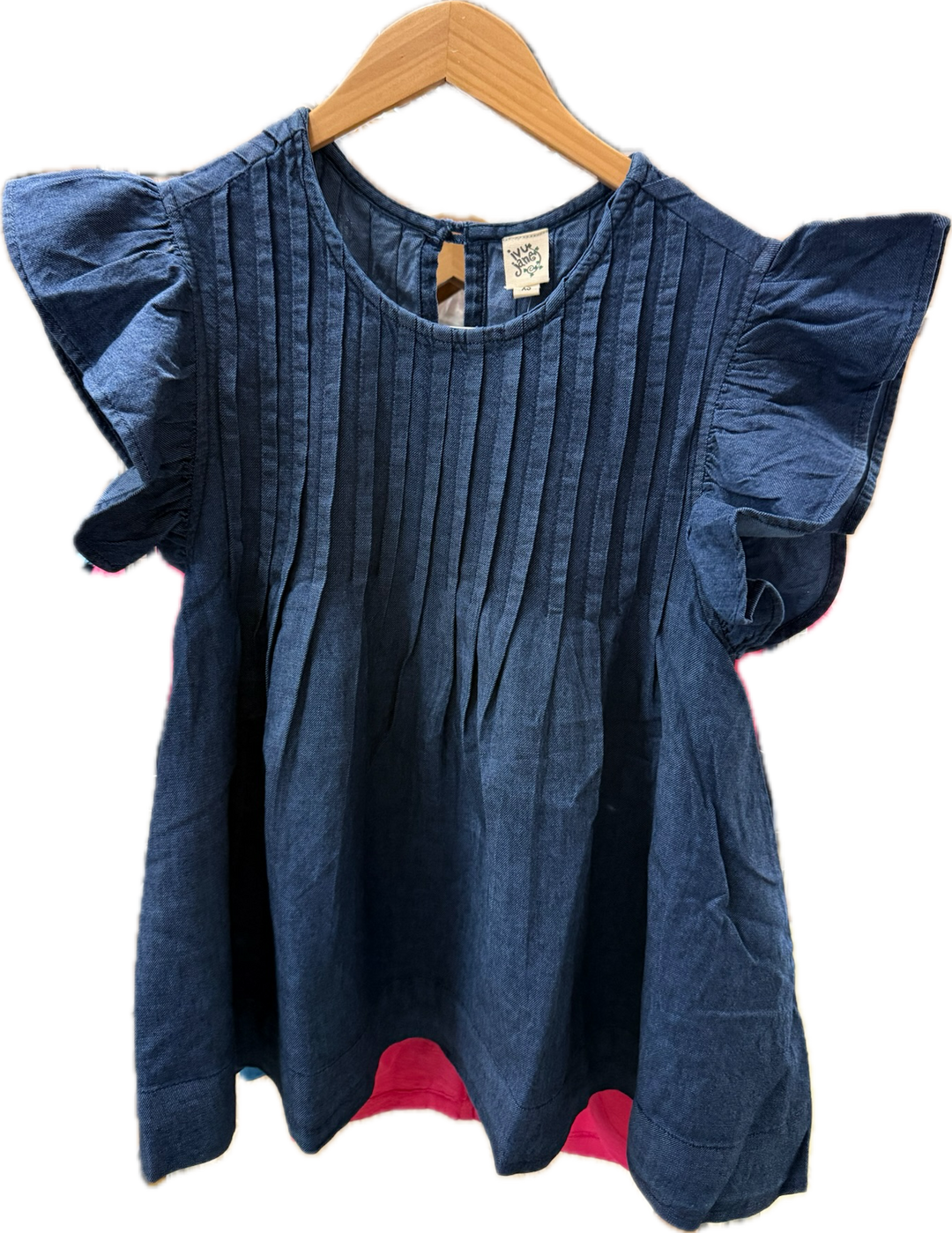 Sister Mary tucked denim top featuring a casual, fitted design with a button-front and short sleeves, shown on a model.
