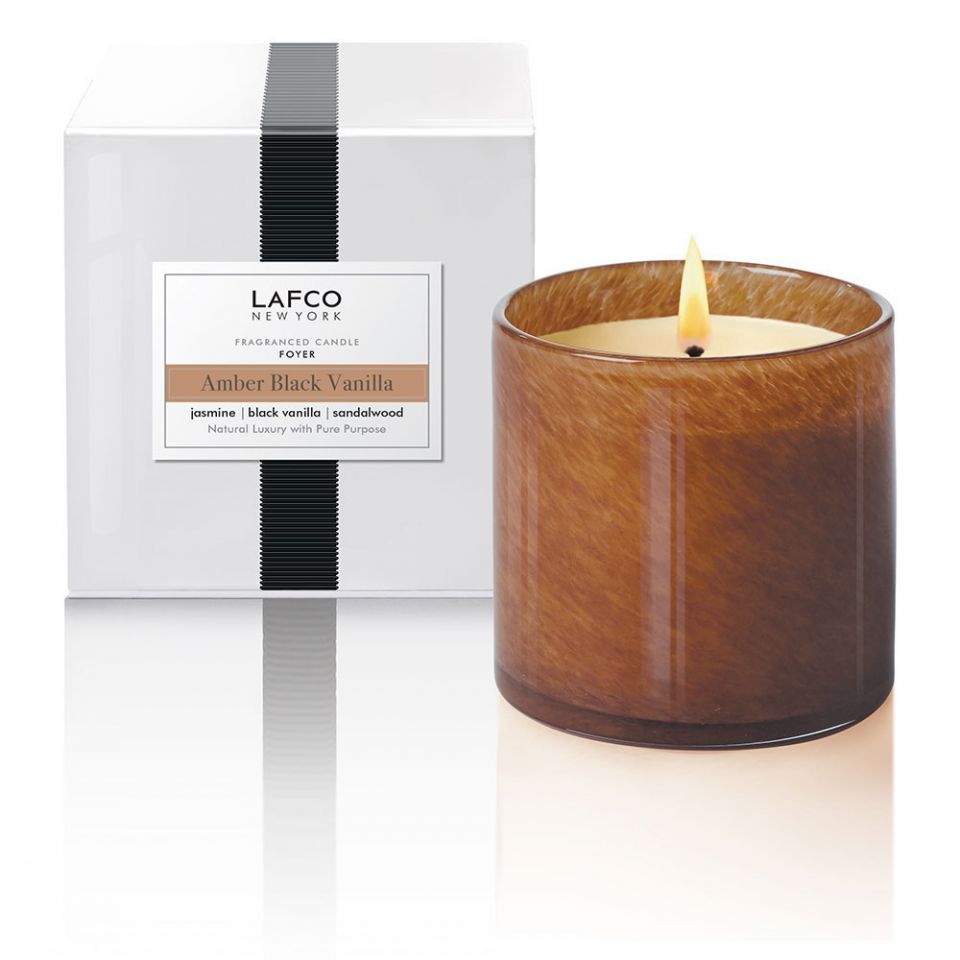 Lafco 15.5oz home candle with a sleek glass jar and elegant label, perfect for adding ambiance to any room.